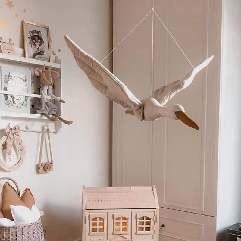 beautiful swan hanging from the ceiling and becomes a unique decoration in any nursery/kid's room. It is soft and durable.