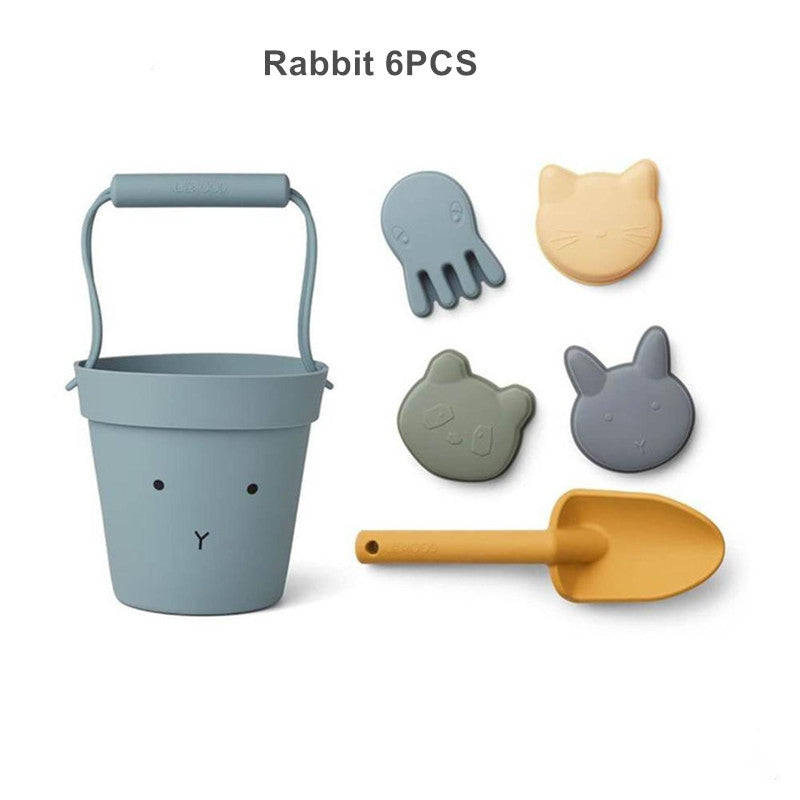 Silicone sandbox tool set for toddler/kids/babies that contains bucket, shovel and moulds