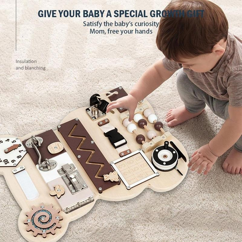 A toddler playing with the wooden bear board